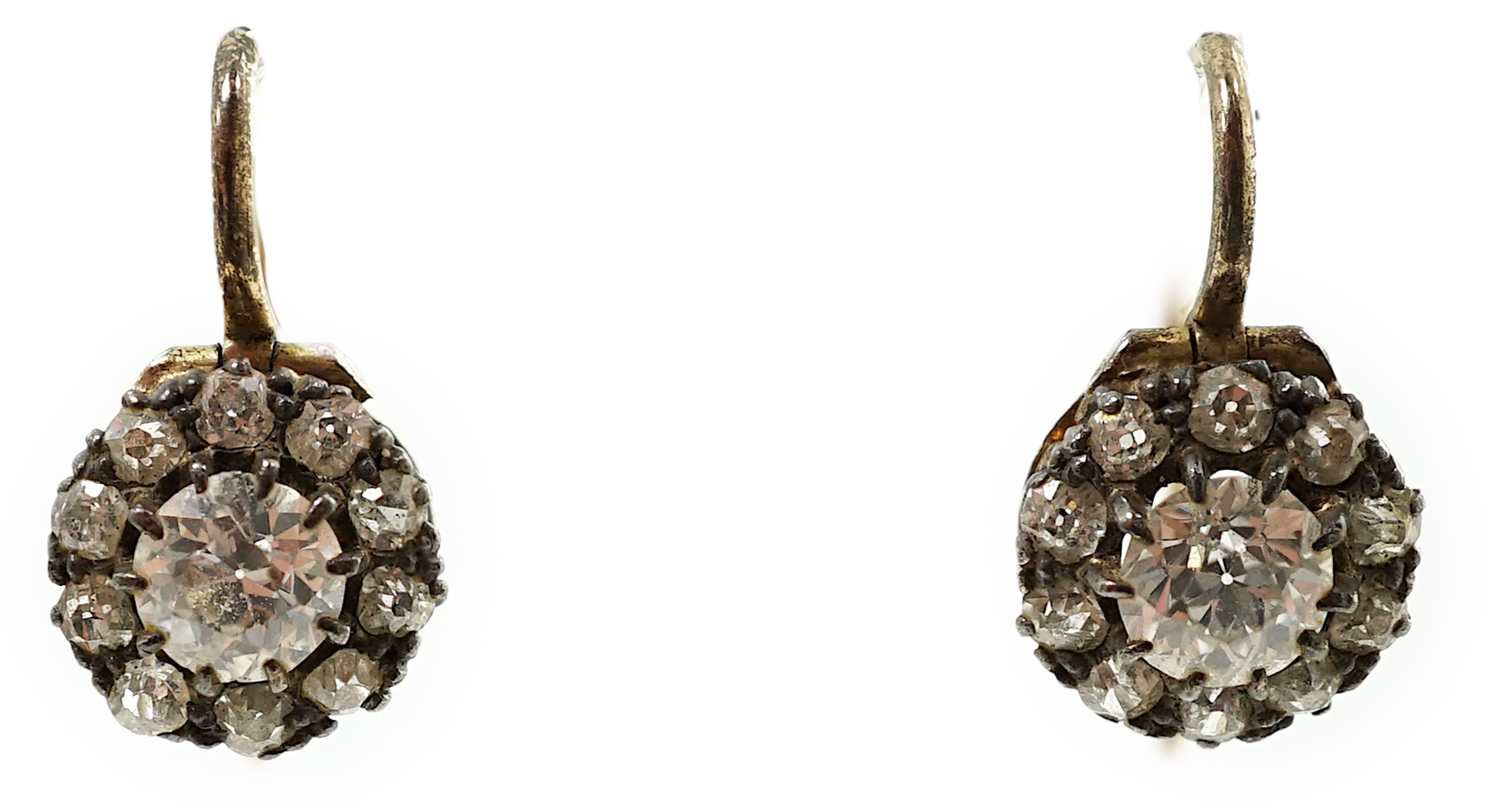 A pair of late Victorian gold and diamond cluster set earrings